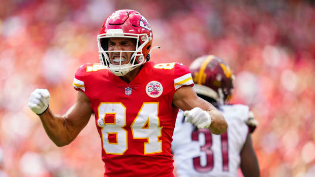 Aug 20, 2022; Kansas City, Missouri, USA; Kansas City Chiefs wide receiver Justin Watson (84) celebrates after catching a pass against the Washington Commanders during the first half at GEHA Field at Arrowhead Stadium. Mandatory Credit: Jay Biggerstaff-USA TODAY Sports